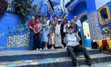 18 Days Morocco Tours From Casablanca,Hassan II Mosque in Casablanca during 18-day Morocco tour." "Blue streets of Chefchaouen on Morocco tour from Casablanca." "Camel trekking in Merzouga Sahara Desert, Morocco." "Ancient kasbahs of Ait Benhaddou on Morocco travel itinerary." "Ouzoud Waterfalls scenic view on Morocco tour." "Vibrant souks and gardens of Marrakech on Morocco tour."