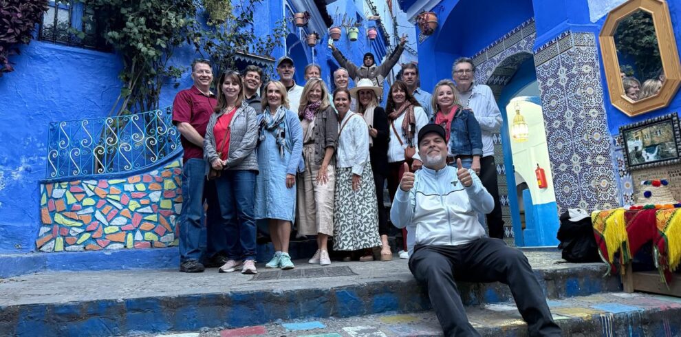 18 Days Morocco Tours From Casablanca,Hassan II Mosque in Casablanca during 18-day Morocco tour." "Blue streets of Chefchaouen on Morocco tour from Casablanca." "Camel trekking in Merzouga Sahara Desert, Morocco." "Ancient kasbahs of Ait Benhaddou on Morocco travel itinerary." "Ouzoud Waterfalls scenic view on Morocco tour." "Vibrant souks and gardens of Marrakech on Morocco tour."