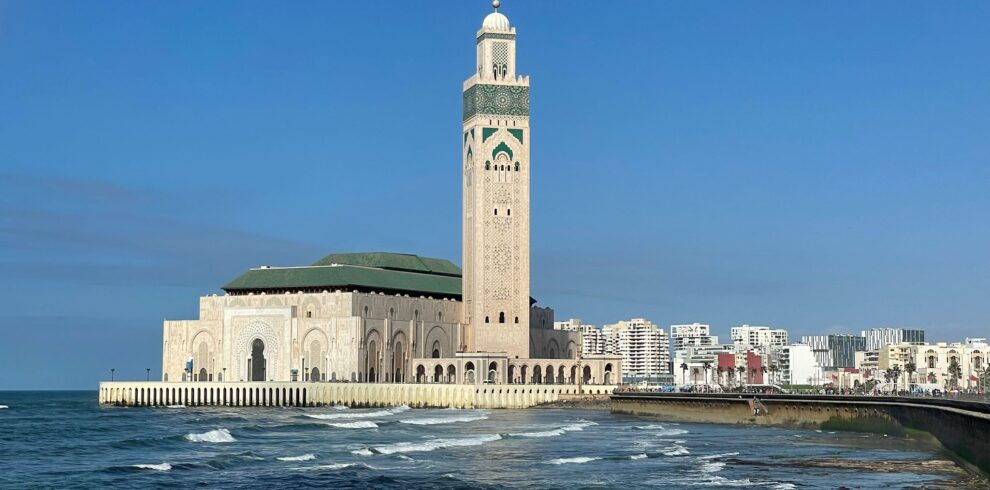 10 Days Morocco Tour,Casablanca – Hassan II Mosque: “Hassan II Mosque in Casablanca, Morocco, on a sunny day, showcasing its intricate architecture and oceanfront location.” Chefchaouen – Blue City: “Scenic streets of Chefchaouen, Morocco, painted in vibrant shades of blue with traditional Moroccan architecture.” Meknes & Volubilis: “Ancient Roman ruins of Volubilis near Meknes, Morocco, with historic columns and archaeological site views.” Ziz Valley: “Lush Ziz Valley in Morocco, with palm trees, desert landscapes, and winding river views.” Merzouga Desert: “Golden sand dunes of Merzouga in the Sahara Desert, Morocco, with camel caravans at sunset.” Sahara Desert Camp: “Traditional desert camp in Merzouga, Morocco, under a starry night sky in the Sahara Desert.” Todra Gorge: “Dramatic cliffs and narrow canyon of Todra Gorge in Morocco, ideal for hiking and adventure.” Dades Valley: “Rocky landscapes and winding roads of Dades Valley, Morocco, surrounded by towering cliffs.” Ait Benhaddou: “UNESCO World Heritage site Ait Benhaddou in Morocco, historic ksar with earthen clay architecture.” Marrakech – Jemaa el-Fnaa: “Vibrant Jemaa el-Fnaa square in Marrakech, Morocco, filled with market stalls, locals, and tourists.”