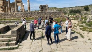 17 Days Morocco Tour From Casablanca ,The stunning Hassan II Mosque in Casablanca, Morocco, with its intricate architecture and towering minaret overlooking the Atlantic Ocean,A narrow street in Chefchaouen, Morocco, lined with blue-painted buildings and flower-filled balconies in the city's famous medina,A camel caravan crossing the vast sand dunes of Erg Chebbi in the Sahara Desert during sunset, with a golden sky in the background,he ancient fortified village of Ait Benhaddou, a UNESCO World Heritage site, with its mud-brick kasbahs and dramatic desert backdrop,The bustling Jemaa el-Fnaa square in Marrakech, filled with street performers, food vendors, and crowds of people during the day