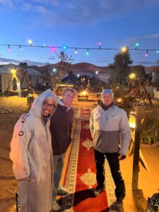 4 Days Marrakech Desert Tour/Camel caravan at sunset on Erg Chebbi dunes during a 4-day Marrakech desert tour to Merzouga.