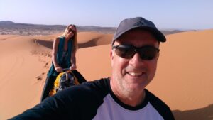 Five Day Marrakech Desert Itinerary.Camel trek at sunset in Erg Chebbi dunes during 5 day Marrakech desert itinerary - Morocco desert tour highlight