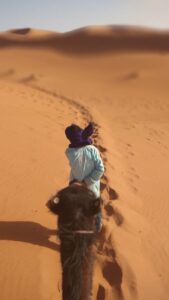 Marrakech Desert Tour Eight Day,Golden sunrise over Erg Chebbi sand dunes during a luxury 8-day Marrakech desert tour.