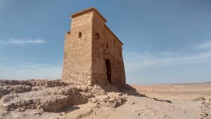 Your Ultimate Marrakech Desert Trip Ten Days .A family enjoying a traditional Moroccan meal together on a Morocco family tour 10 day.