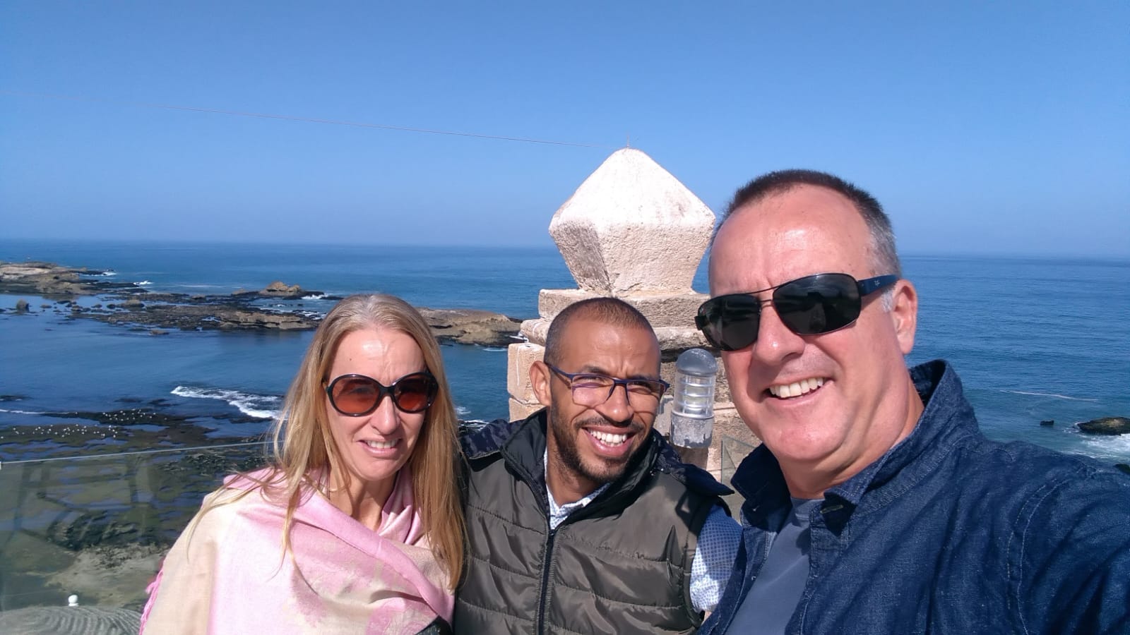 Morocco Tours for Canadians,Canadian couple enjoying a camel trek in Merzouga Sahara Desert with Rachid Morocco Tours