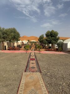 Camel trek across the Merzouga dunes during our private 4-day desert tour from Marrakech.